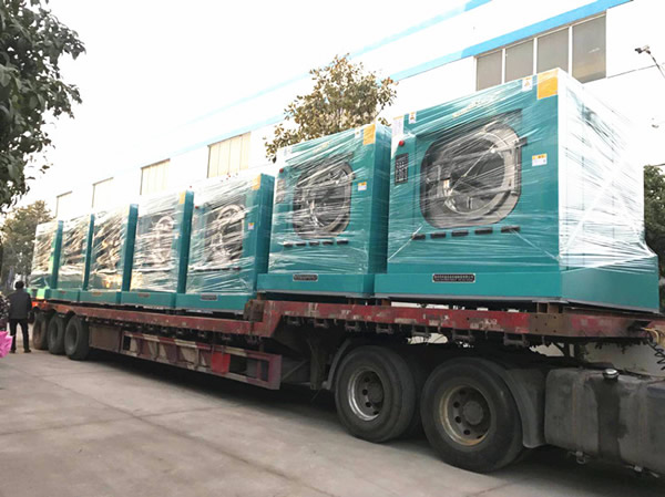 Self dumping washing machine